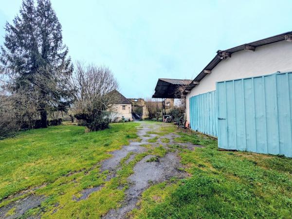 Ferme de caractère avec dépendances et beau potentiel