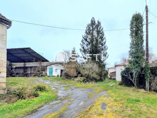 Ferme de caractère avec dépendances et beau potentiel