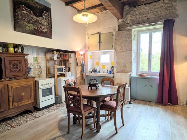 Ferme de caractère avec dépendances et beau potentiel