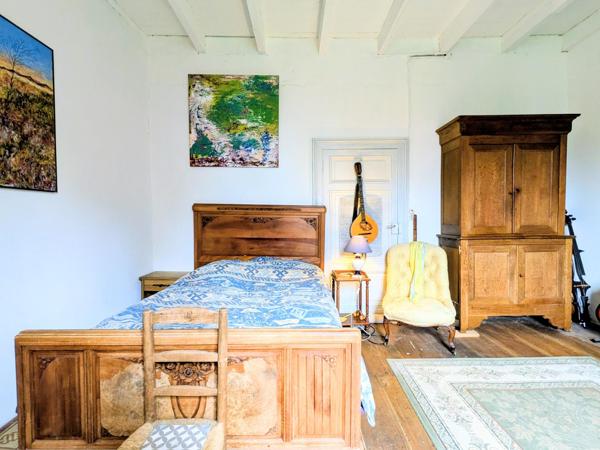 Ferme de caractère avec dépendances et beau potentiel