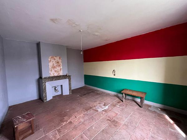 Ancienne bâtisse avec jardin située au centre de Bessières !