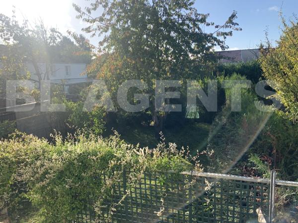 Maison 4 chambres avec garage à fort potentiel