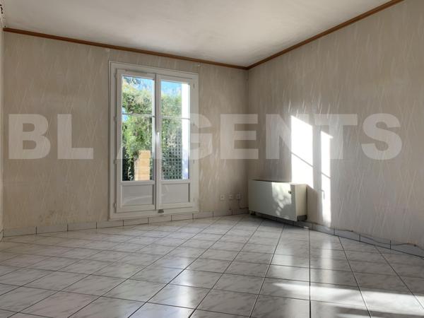 Maison 4 chambres avec garage à fort potentiel