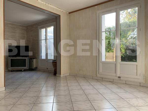 Maison 4 chambres avec garage à fort potentiel