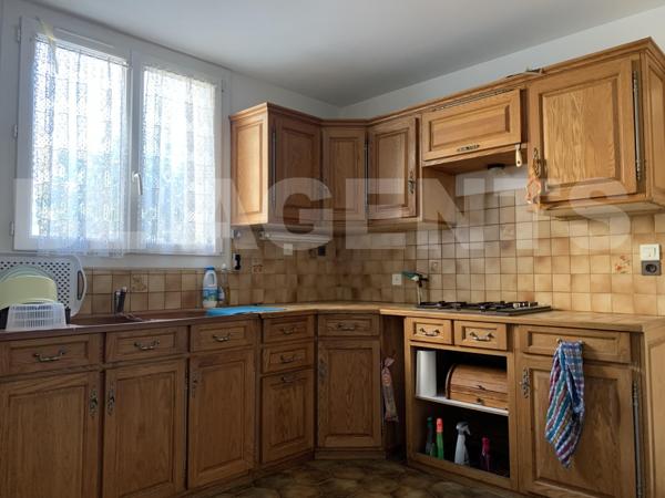 Maison 4 chambres avec garage à fort potentiel