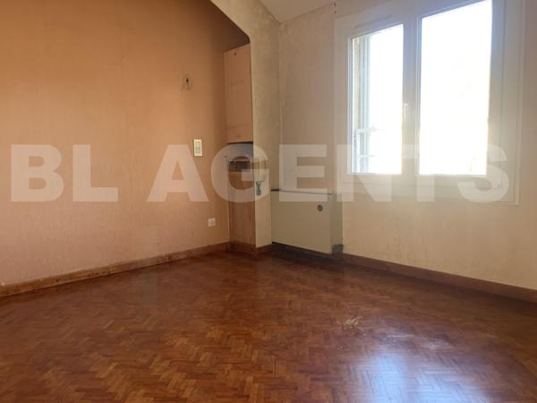 Maison 4 chambres avec garage à fort potentiel