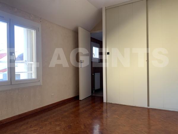 Maison 4 chambres avec garage à fort potentiel