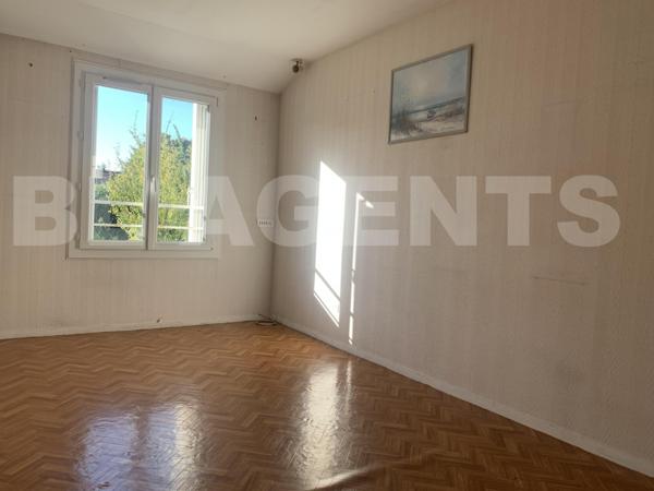 Maison 4 chambres avec garage à fort potentiel