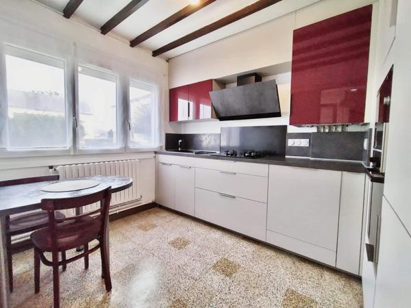 Maison 4 pièces de 75 m² au calme avec garage, sous-sol et terrain de 356 m²