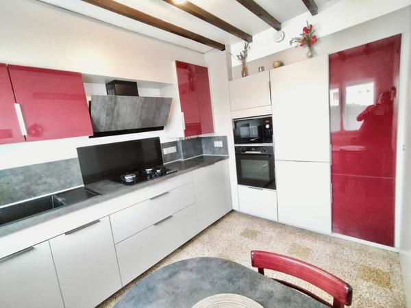 Maison 4 pièces de 75 m² au calme avec garage, sous-sol et terrain de 356 m²
