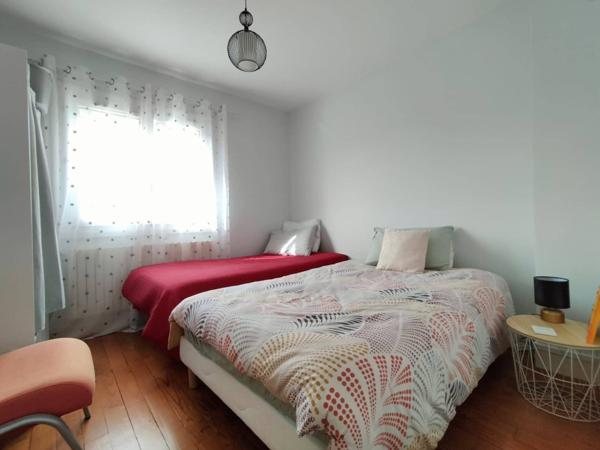 Maison 4 pièces de 75 m² au calme avec garage, sous-sol et terrain de 356 m²