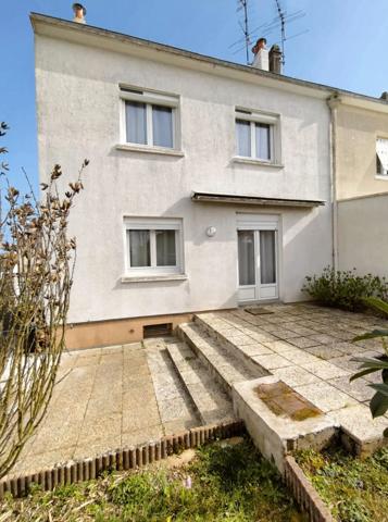 Maison 4 pièces de 75 m² au calme avec garage, sous-sol et terrain de 356 m²