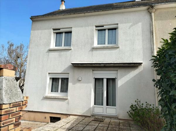 Maison 4 pièces de 75 m² au calme avec garage, sous-sol et terrain de 356 m²