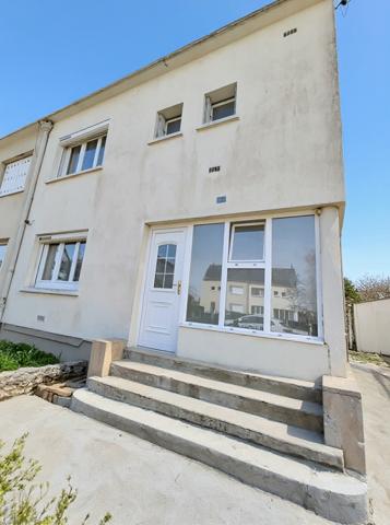 Maison 4 pièces de 75 m² au calme avec garage, sous-sol et terrain de 356 m²