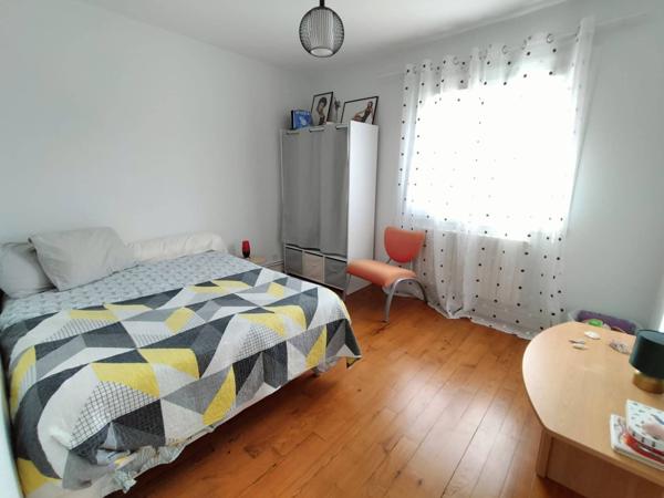 Maison 4 pièces de 75 m² au calme avec garage, sous-sol et terrain de 356 m²