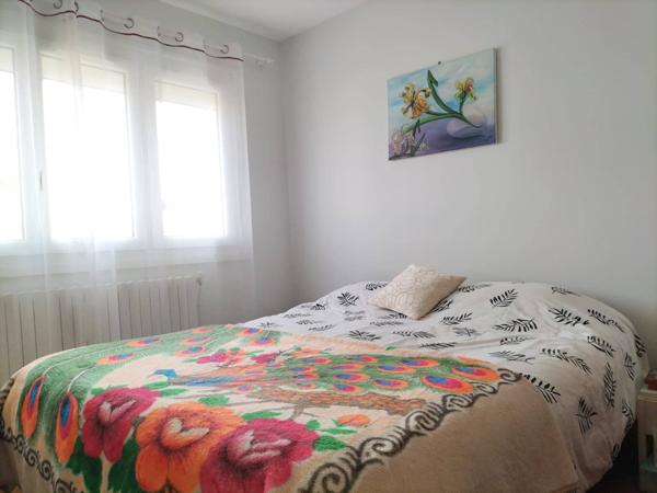 Maison 4 pièces de 75 m² au calme avec garage, sous-sol et terrain de 356 m²