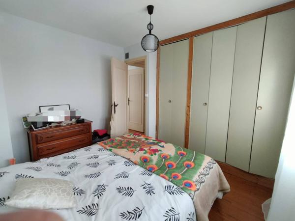 Maison 4 pièces de 75 m² au calme avec garage, sous-sol et terrain de 356 m²