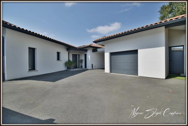 Maison d'architecte à vendre 6 pièces  (40) de 168 m² avec appartement indépendant