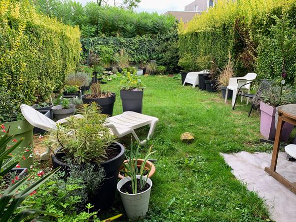 Maison 4 pièces avec grand jardin et garage