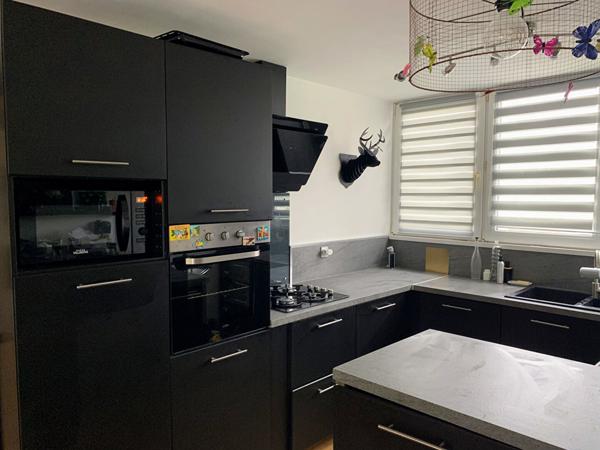 Maison 4 pièces avec grand jardin et garage