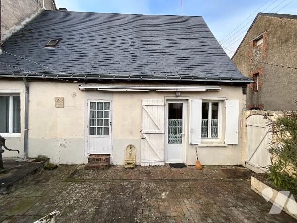 Charmante maison de ville de 70 m² avec jardin, garage et dépendance
