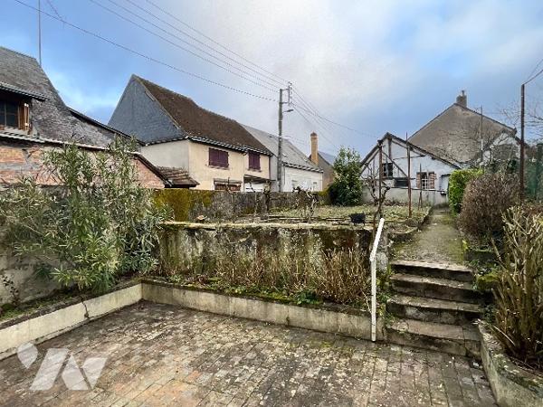 Charmante maison de ville de 70 m² avec jardin, garage et dépendance