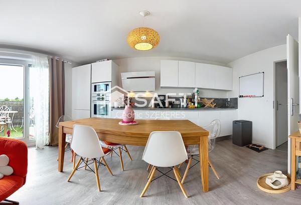 T3 avec balcon et stationnement