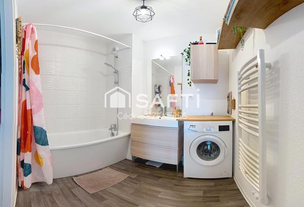 T3 avec balcon et stationnement