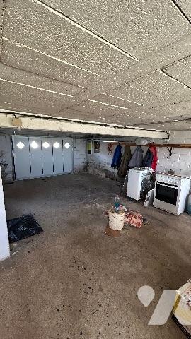 Une Maison à usage d'habitation.