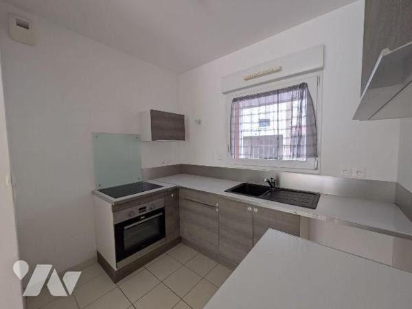 Hennebont, centre ville, proche toutes commodités, appartement en rez-de-chaussée, au sein d'un...