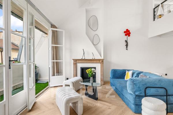 Appartement duplex en dernier étage avec blacon et terrasse sur l'Ile Saint Louis