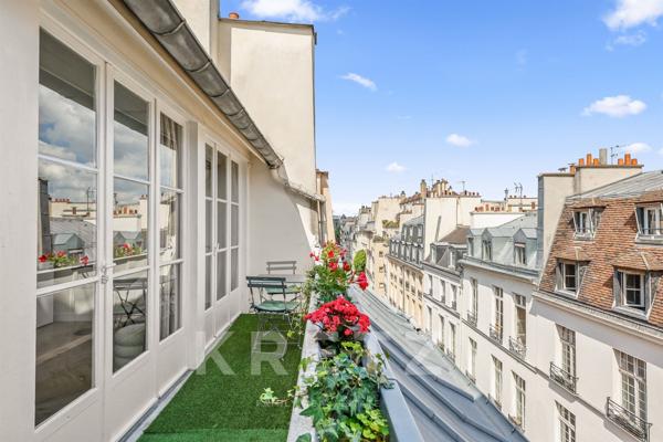 Appartement duplex en dernier étage avec blacon et terrasse sur l'Ile Saint Louis