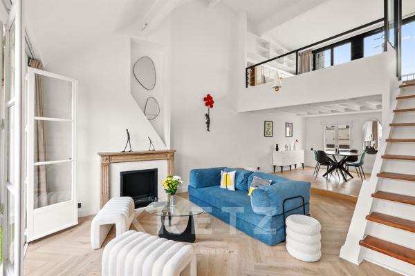 Appartement duplex en dernier étage avec blacon et terrasse sur l'Ile Saint Louis