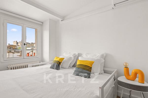 Appartement duplex en dernier étage avec blacon et terrasse sur l'Ile Saint Louis