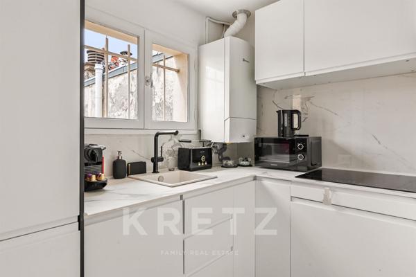 Appartement duplex en dernier étage avec blacon et terrasse sur l'Ile Saint Louis