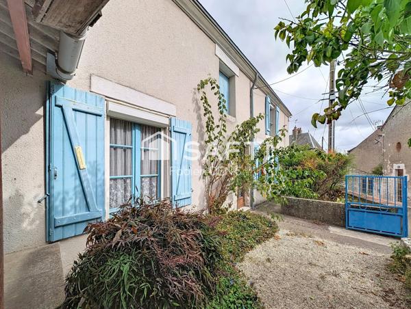 Maison de ville avec 3/4 chambres et garage