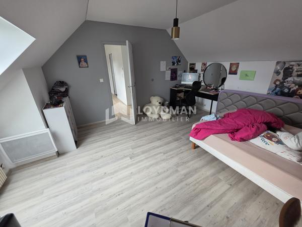 Maison 6 pièces de 165m2 sur un terrain de 1453m2