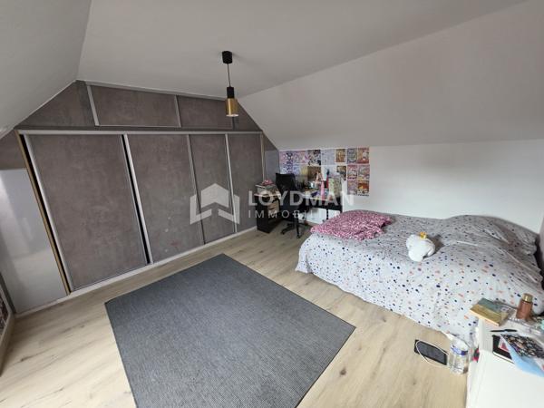 Maison 6 pièces de 165m2 sur un terrain de 1453m2