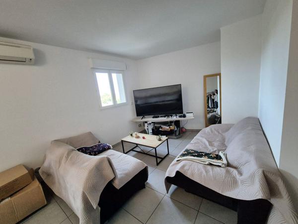 Studio de 42m2 avec une grande terrasse de 14m2 et place de parking privé