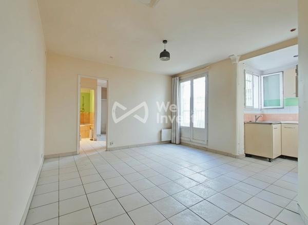 PARIS 18e – 2 PIÈCES 33,51 M² – REZ-DE-CHAUSSÉE SUR COUR – EXTÉRIEUR D’ENVIRON 10 M² – POTENTIEL PROFESSION LIBÉRALE
