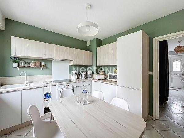 Maison familiale à vendre à Somain - 5 chambres, jardin et garage - Prix : 232.900 euros