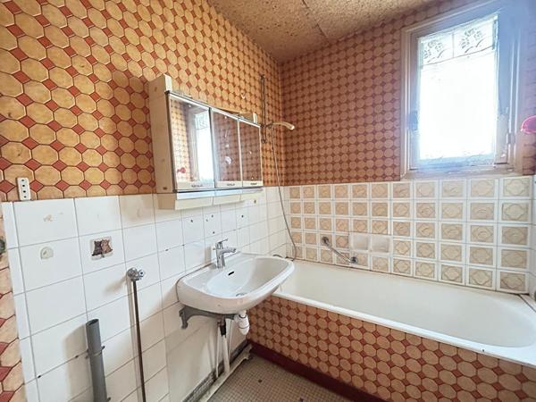 Appartement de type 3 - avec cave et stationnement sécurisé.