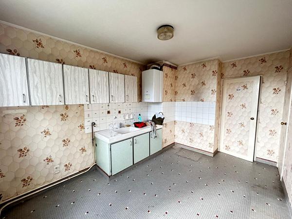 Appartement de type 3 - avec cave et stationnement sécurisé.
