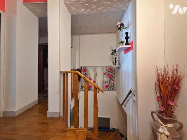 Maison mitoyenne avec garage