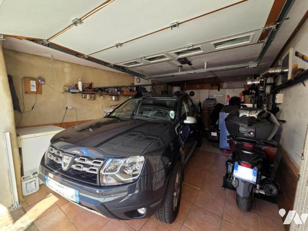Maison mitoyenne avec garage