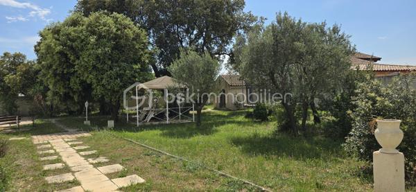 A 12' de GIGNAC,  à CANET, charmant Village et Dynamique, se situe cette propriété au style provençal immédiat, avec une légère touche 'néo-coloniale'.
Bienvenue dans ce lieu RARE, où vos projets prendront VIE,.... et où les mètres carrés ne sont jamais de trop!
Ici, tout commence avec une VILLA quasi de plain-pied (env 255 M² - 5 chambres), au charme atypique, d'inspiration 'andalouse', nichée sur un écrin de 3701 m². Une base SAINE, SOLIDE, prête à revisiter à votre goût.

COTE INTERIEUR: Volumes généreux, plusieurs chambres dont 1 suite parentale, en accès sur Terrasse de 65 m² et surtout ... un VERITABLE espace bureau digne de ce nom.
A la perfection pour télé-travailler, recevoir votre clientèle ou créer votre activité, sans empiéter sur la vie de famille.

COTE EXTERIEUR: Et là, on change de DIMENSION ! 
Dépendance, piscine, salle de sport, double garage, tout est déjà en place pour accueillir vos idées les plus ambitieuses (possible de détacher une parcelle... opportunité de projet complémentaire).

BONUS: les stationnements sont XXL et faciles, une configuration idéale pour: 
- profession libérale
- artisan/entrepreneur
- PROJET familial, MULTI-GENERATIONS
Ou simplement... vivre avec de l'ESPACE (le vrai!)

Cette DEMEURE est un BIEN à moderniser, avec une BASE EXCEPTIONELLE pour une VALORISATION IMMEDIATE et future.

Localisation++++ : A 11' A75 - 13' A750 - 19' PEZENAS - 25' des plages et 35' BEZIERS ou Montpellier
Plan et vidéos à disposition
Visite sur financement validé