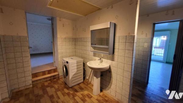 Hérimoncourt, maison mitoyenne quatre pièces avec garage