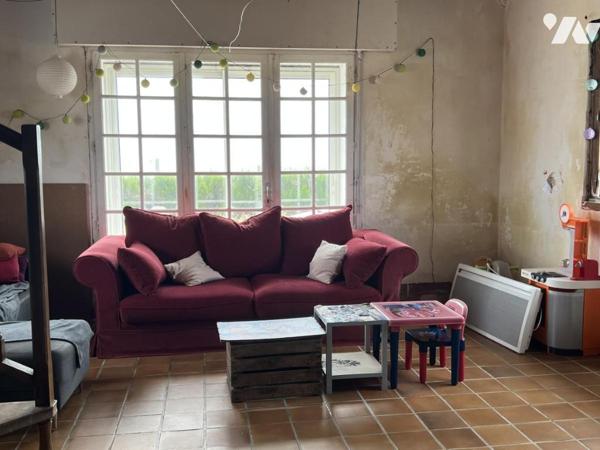 PROPRIETE ATYPIQUE EN FRONT DE MER