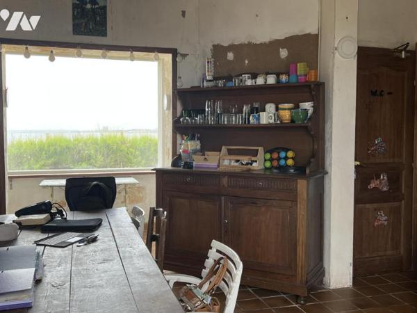 PROPRIETE ATYPIQUE EN FRONT DE MER