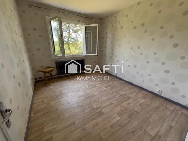 Maison familiale avec grand terrain et un atelier équipé